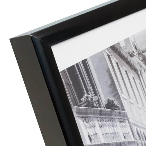 Black wooden photo frame on white background