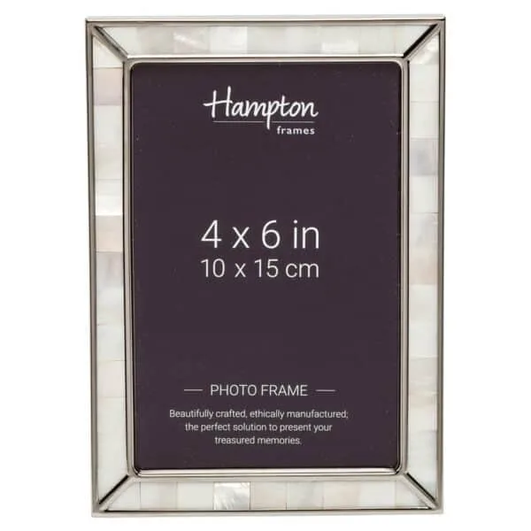 Elegant wooden photo frame on white background