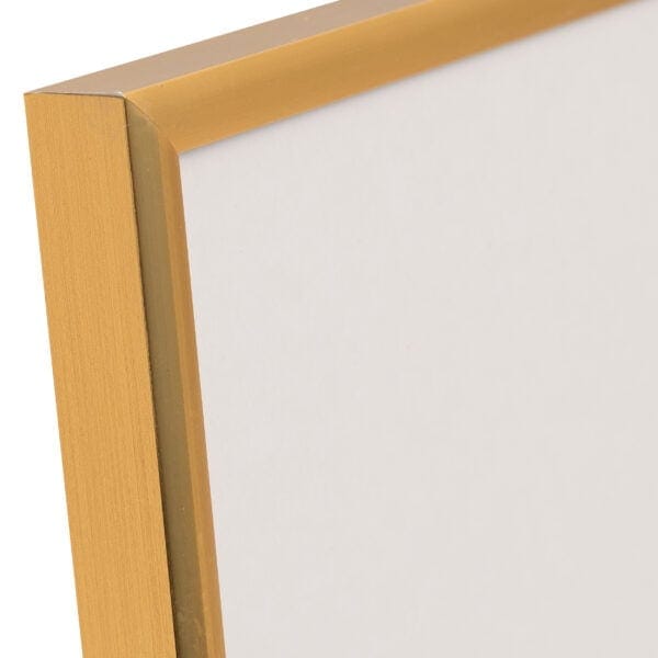 Close-up of golden frame with white canvas