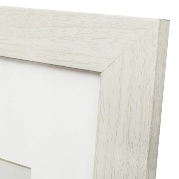 Close-up of light wood textured picture frame