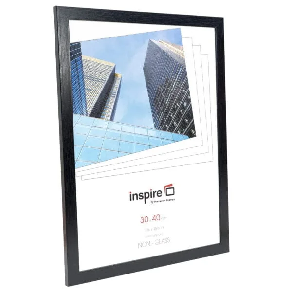 Framed photo of modern skyscrapers reflecting blue sky