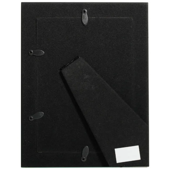 Black binder closed with metal fasteners and label space