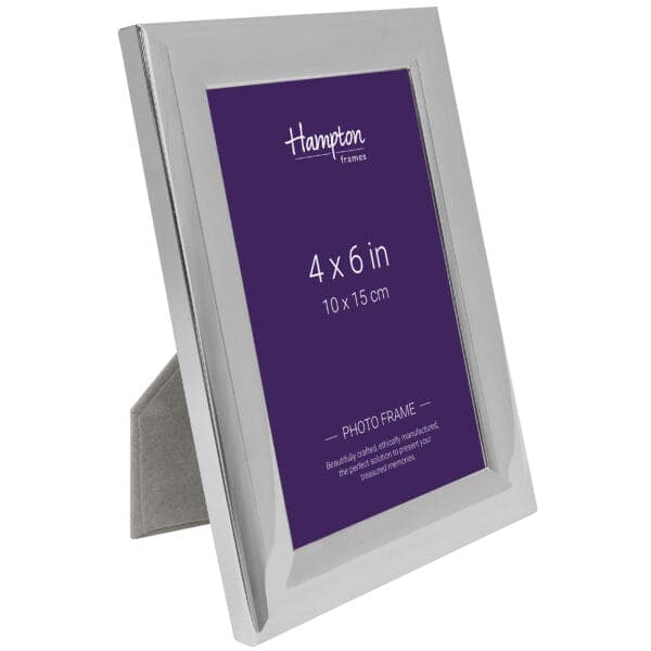 Silver photo frame, 4x6 inches, freestanding.