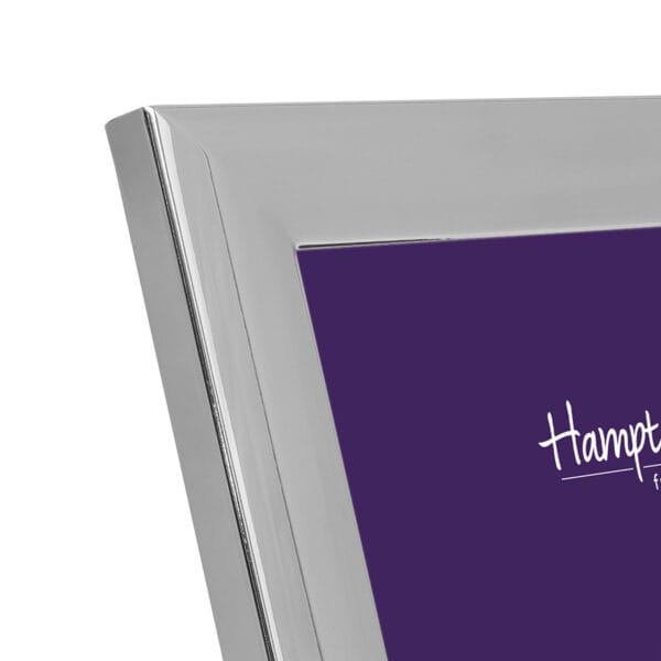 Close-up of a silver photo frame corner