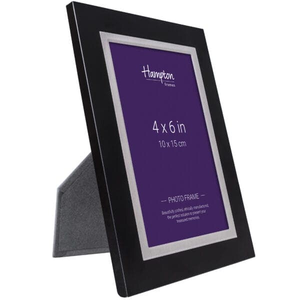 Black photo frame with stand, 4x6 inches.