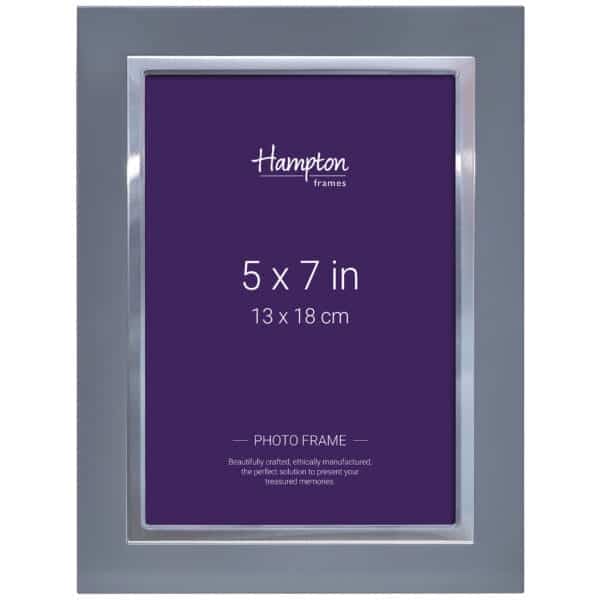 Grey 5x7 inch photo frame with purple background.