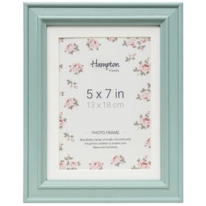 Green photo frame with floral design background.