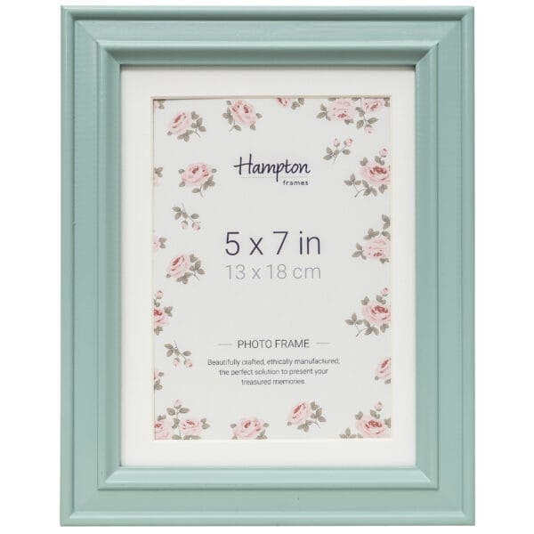 Green photo frame with floral design background.