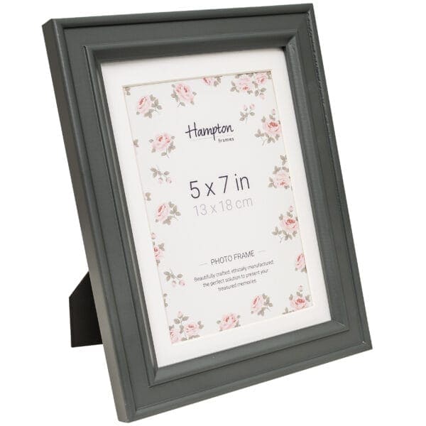 Grey photo frame with floral design.