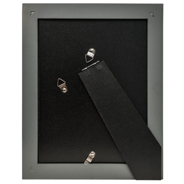 Backside of a photo frame with stand.