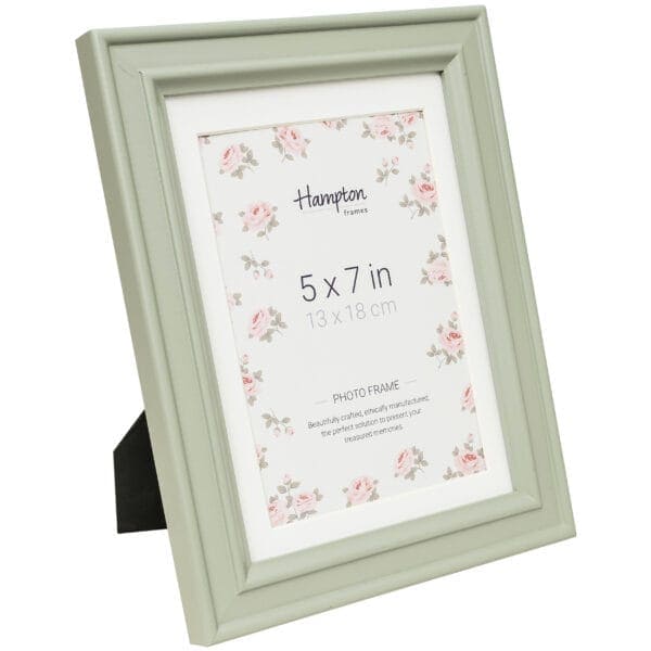 Green photo frame with floral design, 5x7 inches.