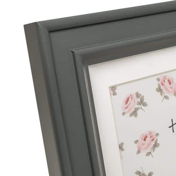 Dark frame with floral print and text
