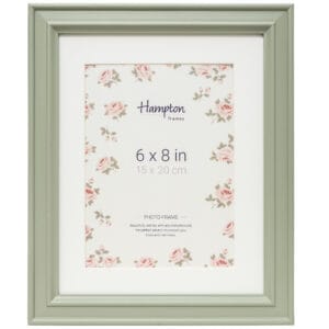 Green photo frame with floral border, 6x8 inches.