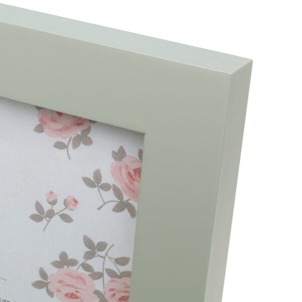 Green photo frame with floral design corner