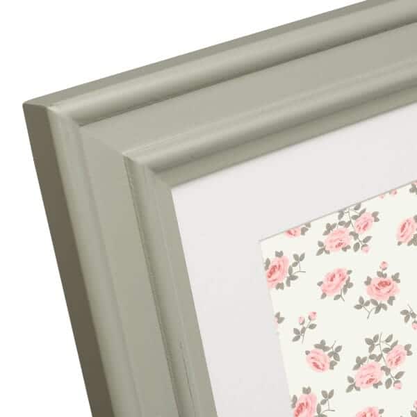 Wooden frame with floral patterned artwork.
