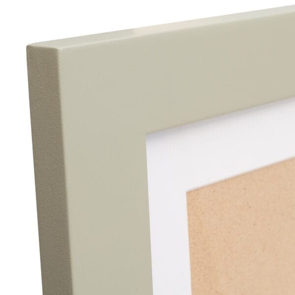 Close-up of green picture frame corner.