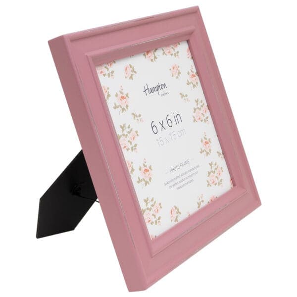 Pink photo frame with floral design, 6x6 inches.