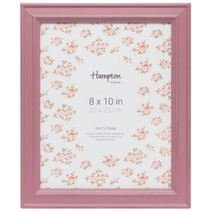 Pink photo frame with floral background.