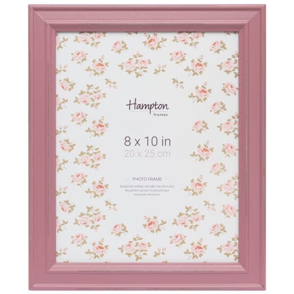 Pink photo frame with floral background.