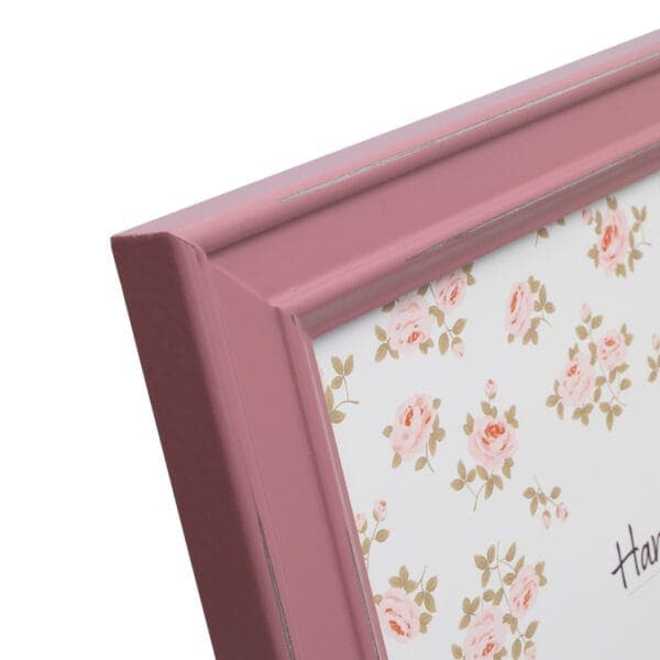 Pink photo frame with floral design