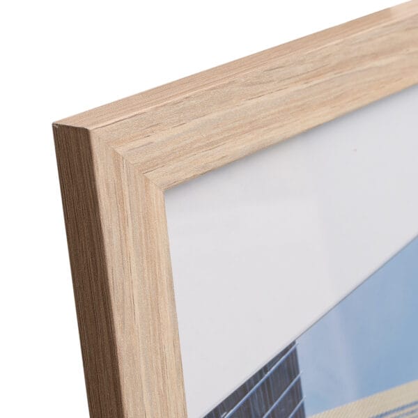 Close-up of wooden picture frame corner.